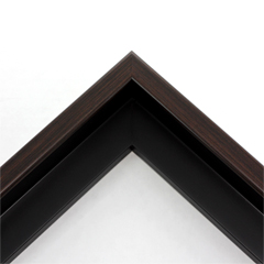 Elegant 1" floater frame. This deep brown floater frame has a slightly rounded profile. The dark chocolate brown face, and profile, have a grained texture and the black interior has a satin finish.