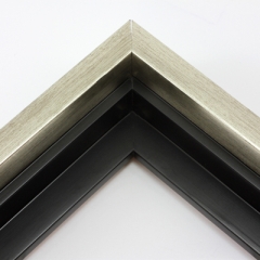 This solid wood canvas floater frame features a glossy brushed silver on the outside edge and topmost face.  The inside step and base are a matte black. 

Display your favourite gallery wrapped Giclée print or painting with authentic, fine art style. This floater frame is ideal for medium to extra large canvases mounted on thick (1.5 " deep) stretcher bars.

*Note: These solid wood, custom canvas floaters are for stretched canvas prints and paintings, and raised wood panels.