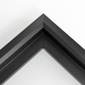 Unique geometric 1 " floater. The face of this molding features an off center peak which gives it a unique contrast in the right lighting.  This frame comes in solid mars black with a dull satin finish.